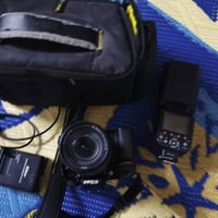 نيكون 7100 • عدسة 18-140 • شتر 18الف