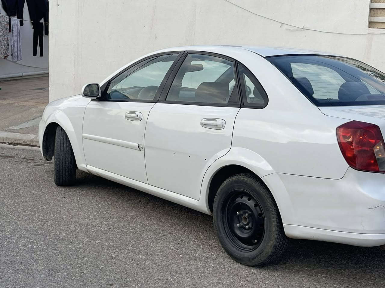 اوبترا 2012 
كير محرك شرط 
رقم بغداد بااسمي السيارة بيها هزة لل 10
السيارة صبغ عام بدون دواخل 
سعرها 68 وبيها مجال بسيط 

***********
