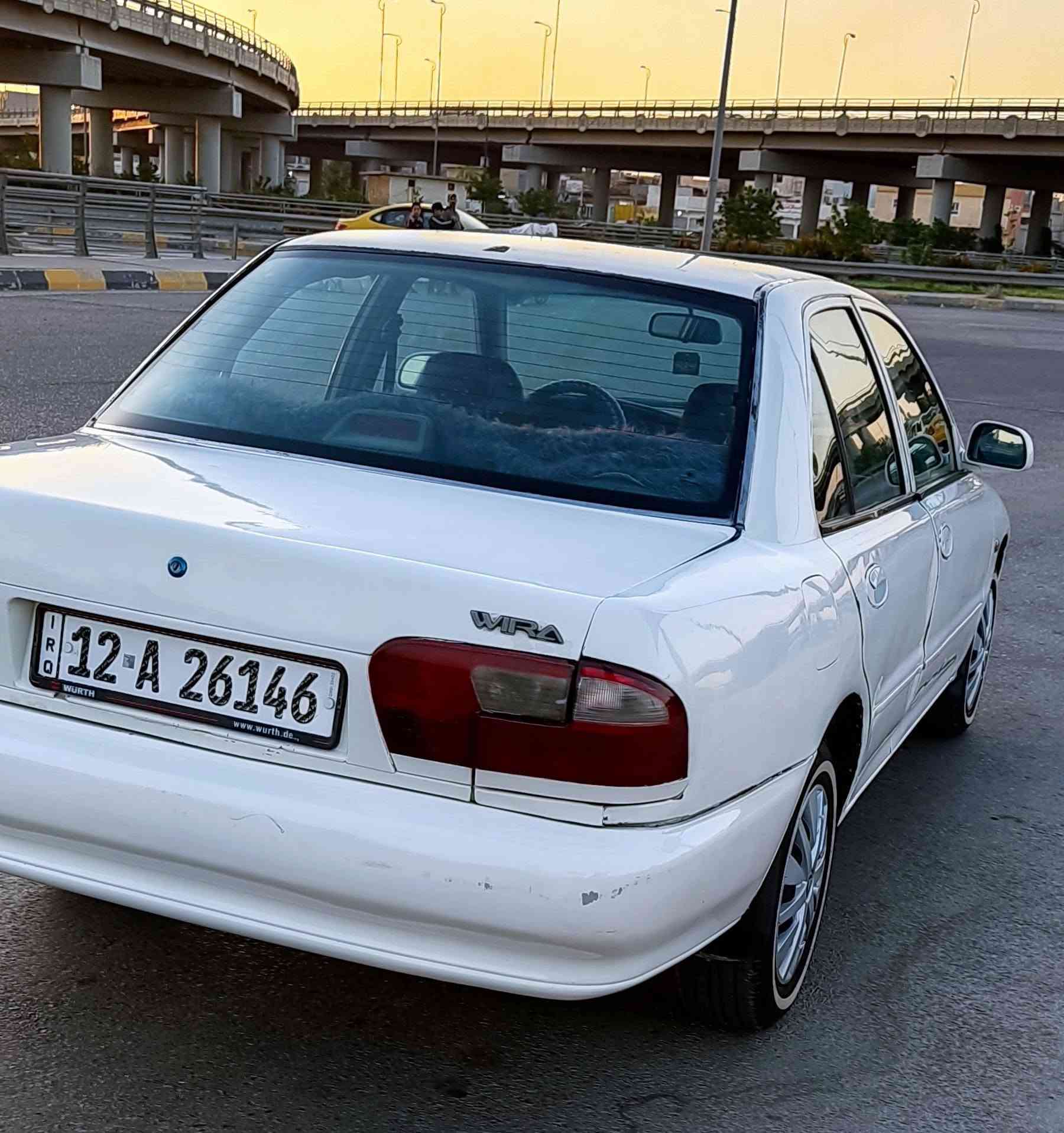بروتون موديل 2002 للبيع (كير عادي)
​النوع: بروتون (Proton)
​الموديل: 2002
​المنظومة: كير عادي (عادي)
​اللون: أبيض
​البودي: صبغ حزم للجمالية (بدون دواخل، الدواخل سليمة تماماً).
​الأضرار: تبديل جاملغ سكن (أمامي) شغل مؤسسة.
​التبريد: شغال.
​الكهربائيات: شغال الكل، ما بيها أي نقص كهربائي.
​الميكانيك: كير ومحرك بشرط الفحص والجاهزية.
​التواير: طخم تاير جديد.
​الأوراق والتحويل: السنوية نافذة لغاية 2028، السيارة باسمي والتحويل بشرط.
​الإضافات: كوبون البانزين الإلكتروني جاهز وموجود مع السيارة.
​السعر: [ 38 ] وبيه مجال للشراي الطيب.
​المكان: نينوى / حي المطاحن الجانب الايمن 
​للاتصال والاستفسار: ***********
