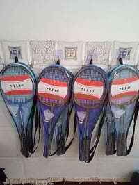 مضرب ريشة • زوج مضارب • مع ريشة