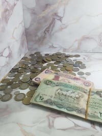 ١٥٤ عملة • ١٠٠ ورقة سويسري • فئة ٢٥ و٥