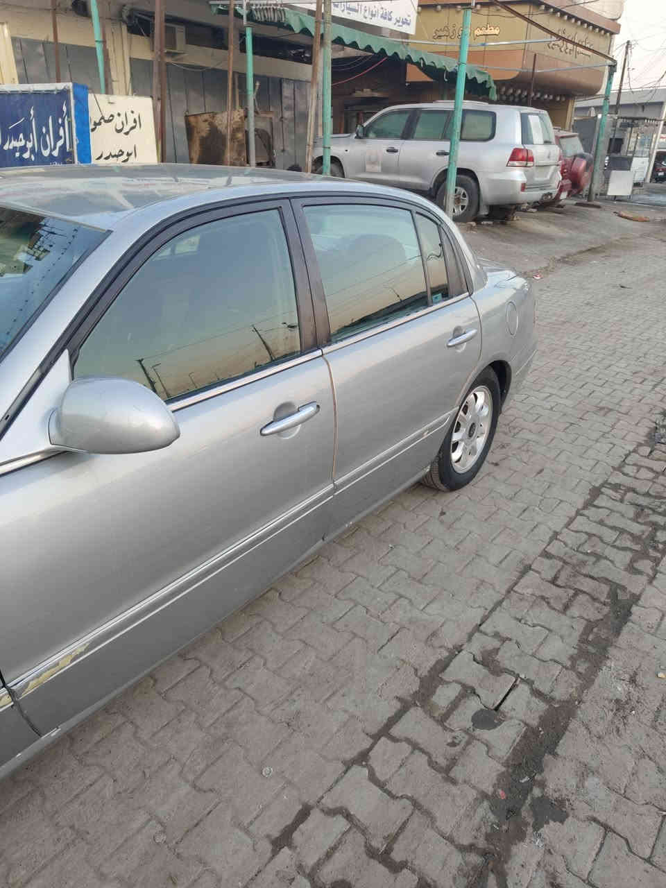 السلام عليكم كيا امانتي موديل 2005 سياره جاهز كلشي جديد بيه مكينه كير افلون  سياره مصبوغه عام  سبب جراد سعر 60 بيه مجال عنوان بغداد. ***********
