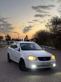 أوبترا 2011  كير اوتماتيك رقم سنويه جديده تبريد تدفئه كير محرك شرط  صو...