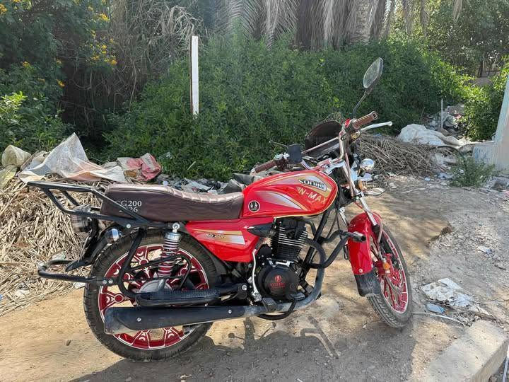 📣 للبيع: دراجة سونيك SONIC N-MAX (حجم 200)
​الموديل: 2026.
​المحرك: 200 سي سي (200cc) - سلف وهندل، كاربريتر بلادها ونظيفة جداً.
​الوضع العام: الدراجة بحالة ممتازة وجاهزة من كل النواحي (شغل واطلع).
​الإضافات: ويلات بلادها الرياضية، كشن جلد بني مطرز، حمالة خلفية، ودعاميات حماية.
​📍 المكان: [بابل_حي الجزائر]
💵 السعر: [900]
📞 للتواصل: [***********] واتساب لا تواجد فيس 👾

