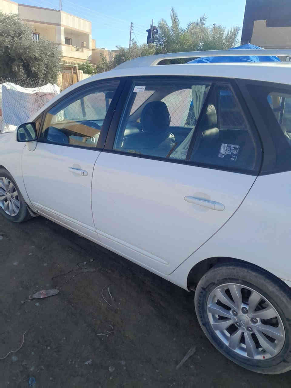 كيا كارينزا ٢٠١٢ محرك جديد تبريد ثلج باسمي *********** بيع مراوس مازدا زوم
