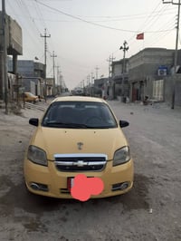 افيو تكسي رقم بغداد انكليزي باسمي سنويه لل29 كير عادي السياره جاهزه ما...
