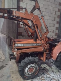 جرار ٢٤ • لودر • معدات ثقيلة