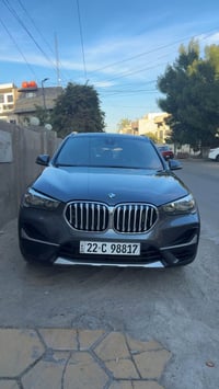 bmw x1 موديل 2022 ضررها موضح بلصور جديده جدآ الباب مبدل بدون صبغ سياره...