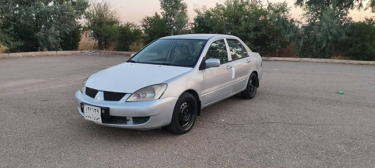 لانسە ر مۆدیل 2009 مە کینە گە ورە ناو فۆرمیکا 3 پارچە بۆیاغ بی ناوگرتن  زۆر خاوینە  گیر مە کینە تە برید بە شە رت سحری 69 ک مە جال ژم *********** كويسينجاك, أربيل
