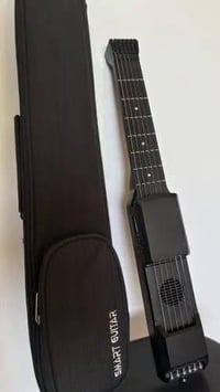 ￼ 🎸 للبيع – AeroBand AG01 Smart Guitar الأصلي عندي قطعتين، تختار اللي ...