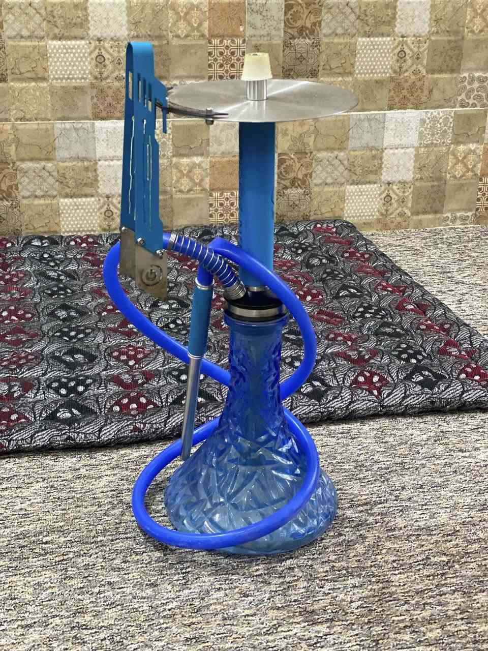 السلام عليكم نركيله  الماني ماركه حلوه معروف مستخدمه قليل مطبوعه إنكليزي شرط الطعم والدخان السعر خاص أو تتصل ***********
