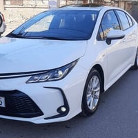 كورلا للبيع هايبرد موديل ٢٤ رقم بغداد  ماشيه ٣٠ الف السعر ١٤٨ وبي مجال...