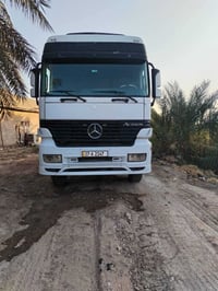 أكتروز • ٢٠٠٠ • بغداد التاجي