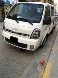 كيا حمل دبل قماره موديل 22 بسمي الباب الئيسر مفتوح الرقم بغداد انكليزي...