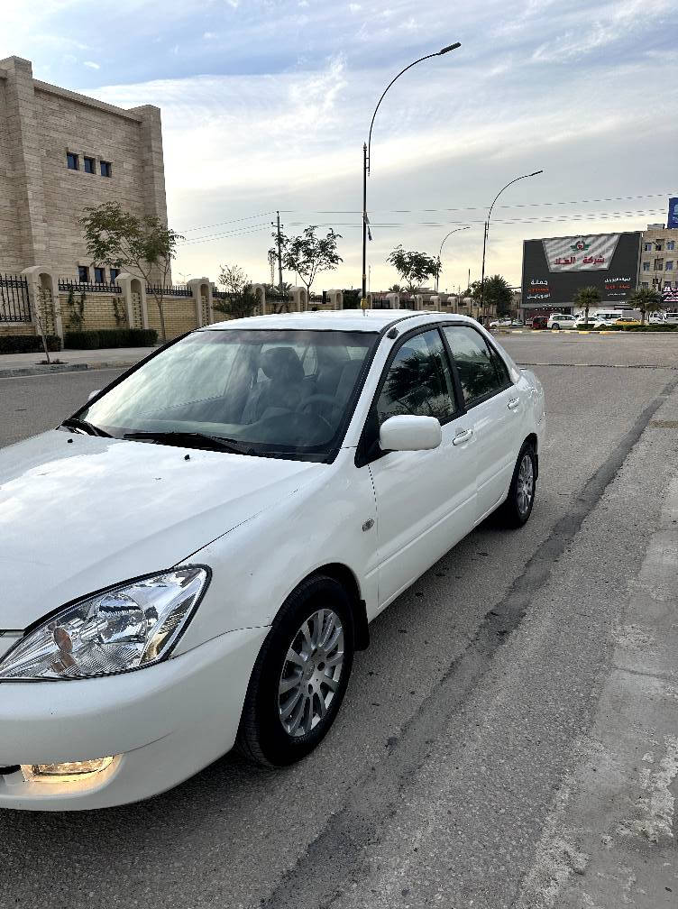 لانسر للبيع مزاد وزارة الداخلية موديل 2006 بيها مكانات ضبغ جاهزه من كلشي مكينه كير حداديه ممتازه للا ستفسار اتصال على الرقم ***********   *********** السعر 58 ورقه وبیها مجال للشراي كربلاء, العراق
