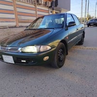 بيع او مراوس  السعر ٤٢ ابروتون موديل ٢٠٠٢  أخضر زيتوني  مصبوغه عام صبغ...