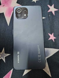 عندي جهاز شاومي 11Lite  جهاز اخو الجديد بدون ملحقات جهاز فقط ذاكرة 256...