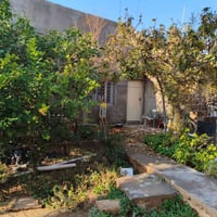 قرب مستشفى راوه • ٤٠٠م طابو • بيت ومشتمل