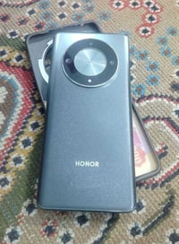 Honor x9b سعره مناسب ممفتوح مكفول من كلشي كامل ملحقات متوفر واتساب 077...