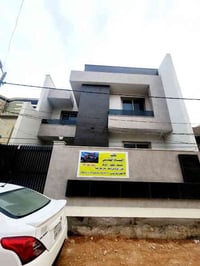 مكتب البسام الهندسي • تصميم تنفيذ إشراف • العروبة شارع المتحف