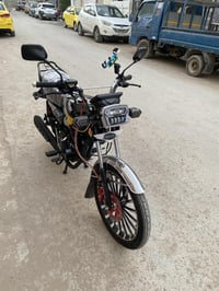 دراجة سونليك سيفان 200cc لون اسود ومكينة سودة،زيرو ماشية اقل من 10km…ص...