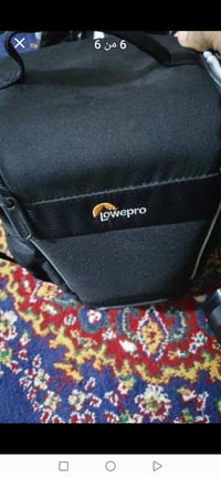 كامرة نيكون • مع بطارية وشنطة • مدينة الصدر