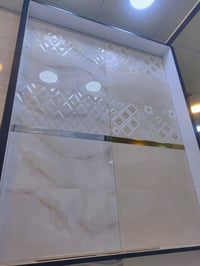 بلاط جدران ايراني • ٣٠×٦٠ • رمادي درجة أولى