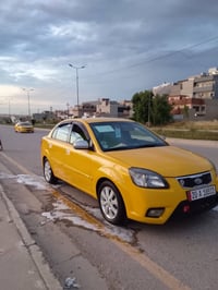 كيا ريو موديل 2010 رقم ديالى نكليزي باسمي ضرر جاملغ وبوند امريكي  مبدل...