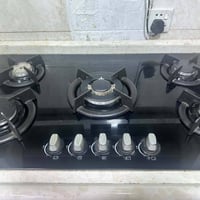 طباخ جديد غير مستخدم مع مرشحه دهون غير مستخدمه للبيع مكان بغداد المشتل...
