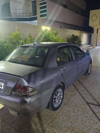 لانسر موديل 2011 مكفوله كفاله عامه عدا طخه صغيره في الجاملغ الامامي كم...