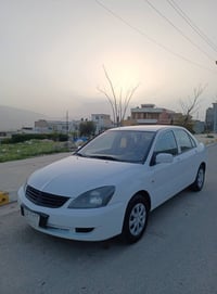 لانسر • ٢٠١١ • توماتيك