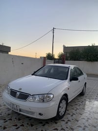 نيسان سني ٢٠٠٢ محدثه ٢٠٠٩ بجم سياره محرك اسود كير عادي جام  اوتوماتيك ...