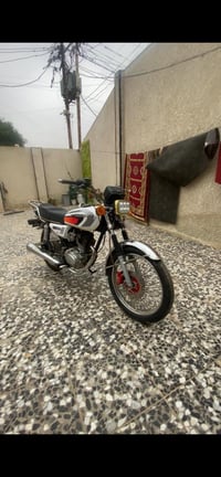 أيراني للبيع مرقم وسنوية نكليزي بغداد دراجة ما ناقصهة أي شي موديل 2021...