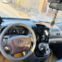 كيا سيدونا للبيع السعر ١٢٧ رقم بغداد سنويه ٢٠٢٧ وارد أمريكي سياره جاهز...