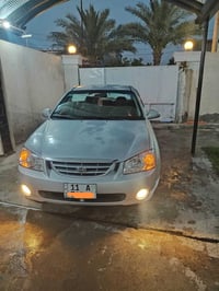 للبيع سبكترا موديل 2005 وارد امريكي ضررها جاملغ الخلفي رقم بغداد بسمي ...
