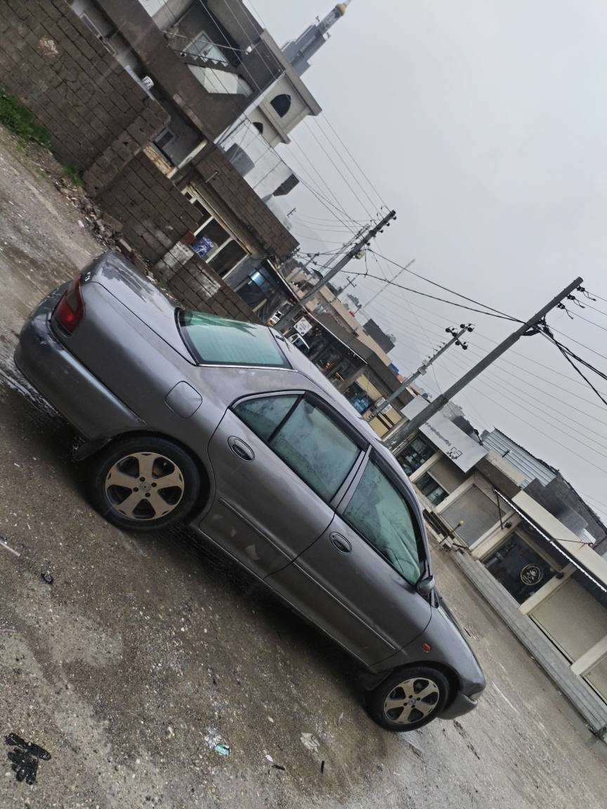 بابەت ڕیکلام
پڕۆتۆن 2004
***********
ئاڕمی پلاستیکی هەولێر بەشەرتی ئاڕم و ئەوەلیات
4تایەی تازەیە
کارەبای کامل ئیش ئەکات
تەبرید سارد و گەرم بەشەرت
گێڕ و مەکینەی بەشەرت
تۆزێکی چەمەلەخی دواوەی دەعمە دیارە لەڕەسمەکا بۆیاخ نەکڕاوە
برێکی مەسبوتە
تەنانەت گڵۆپی ناو سنوقەکەی ئیش ئەکات السليمانية, العراق
