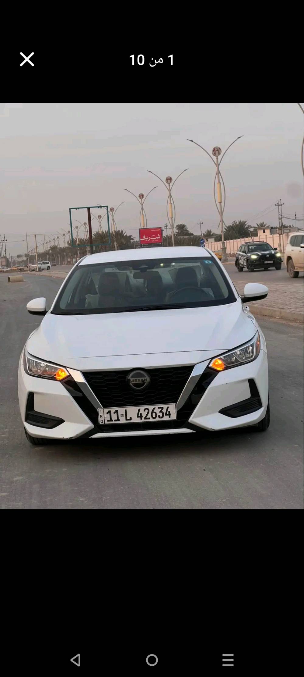 نيسان سينترا SV Plus 2023*
مواصفات أمريكية 

*التفاصيل:*
- *الموديل*: 2023
- *اللون*: ابيض لؤلؤي
- *المحرك*: 2.0 لتر 4 سلندر اقتصادي
- *الكير*: اوتوماتيك CVT
- *الممشى*: 70,000 كم فقط
- *الرقم*: بغداد
- *المكان*: الديوانية


المواصفات 

*الأمان والراحة:*
- شاشة 8 انج لمس + Apple CarPlay + Android Auto لاسلكي
- كاميرا خلفية 
- حساسات خلفية
- رادار أمامي + نظام الفرملة الطارئة
- مثبت سرعة "كروز"
- بصمة تشغيل + بصمة أبواب
- تشغيل عن بعد
- 6 ايرباك
- حساسات ضغط الإطارات

*الداخل والخارج:*
- مقاعد قماش مميزة لفئة SV Plus
- تحكم ستيرن كامل
- تبريد لمس شاشة
-  لايت نهاري
- جنط 16 انش ألمنيوم
- مرايا كهرباء + تدفئة 
*المواصفات:*
- اللون: ابيض
الداخل رصاصي لونين
- المحرك: 2000cc - 4 سلندر
- الكير: اوتوماتيك CVT
- الممشى: 70 ألف كم
- الرقم: بغداد
- المكان: الديوانية
 شاشة، كاميرا خلفية، حساسات، رادار، بصمة، تشغيل عن بعد، كروز، كاربلاي لاسلكي، 6 ايرباك، جنط 16

*السعر: 140 ورقة* 
سيارة نظيفة وشركة واقتصادية بالبنزين، مناسبة للعائلة والدوام. ***********

*السعر المطلوب: 140$ ورقة*