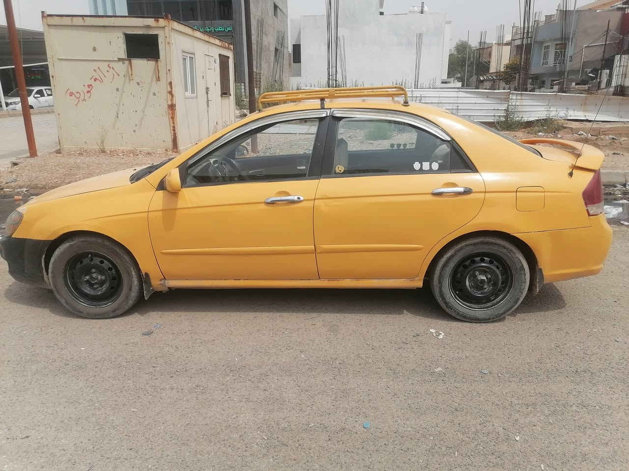 سيارة سبكترا للبيع بأسمي مكاني ديالى مشروع وطني محرك وكير جديد تبريد ثلج ضررها باب السائق تخم تاير جديد باتري جديد  سنوية وهزة. جديدة قبل اسبوع مشروع وطني رقمها انبار رقم انكليزي مصفرة من المرور والهيئة قبل اسبوع رايدها 65 ورقة وبيها مجال قليل  هاتف ***********
