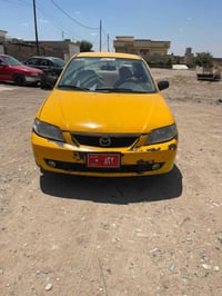 مازدا 323 • سيارة مازدا • مازدا 2004 • سيارة مستعملة • سيارات للبيع • ...