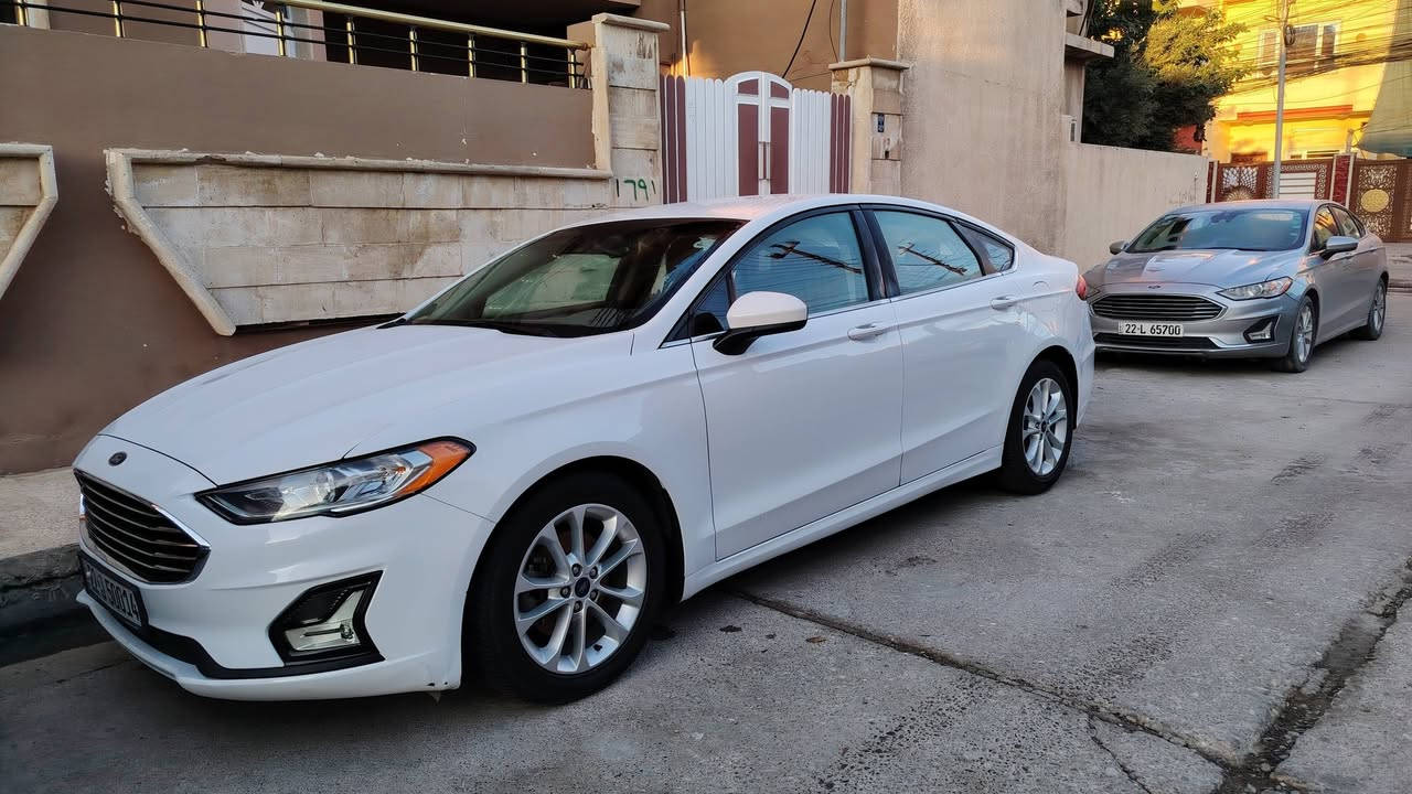 فورد فيوجن 2019  Se فول مواصفات
1500 سي سي توربو
اللون أبيض ثلجي ( لا صدفي ولا اوف وايت) 
تك اكسل المرغوب
لايتات زينون أصلي أبو الضمان
لايتات اوتو و ذكية 
بلوجكتر لد led
داخل أسود
رادار جانبي و خطوط الشارع 

٣ شاشات
شاشة sync 3.4 محدثة آخر اصدار مع برمجة ثيمات و تشغيل فيديوات Mp4
حساسات خلفية
كشن السايق و السكن كهرباء  ١٢ وضعية

مري تعتيم  
ويل 18 نظيف حيل
تبريد لمس  
ماشية 113 الف كيلو متر
كير محرك تبريد كلشي بشرط الفحص والسونار

ضررها بسيط جداً:  بيها صبغ شوية بالچنطة (بالصندوگ) و شبر  يم اللايت الخلفي (بدون دواخل بدون ايرباك). 

👈  سعرها 140 ورقة وبيها مجال  👉

***********
مكان السيارة موصل ـ الساحل الايسر

💥 ملاحظة: السيارة جديدة بمعنى الكلمة. 💥

وجاهزة من كل النواحي شرط ما بيها أي نقص💯
دهون السيارة من شركة موتل الشهيرة. 
دهن گير تم تبديله مرتين (حسب الكتالوك) من شركة موتل.
