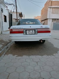 تويوتا كراون • رقم نجف انكليزي • مضروبة خلفية