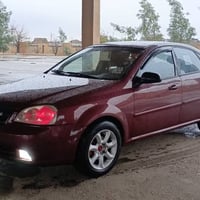 شيفروليه أوبترا • ٢٠٠٤ • كويسينجاك