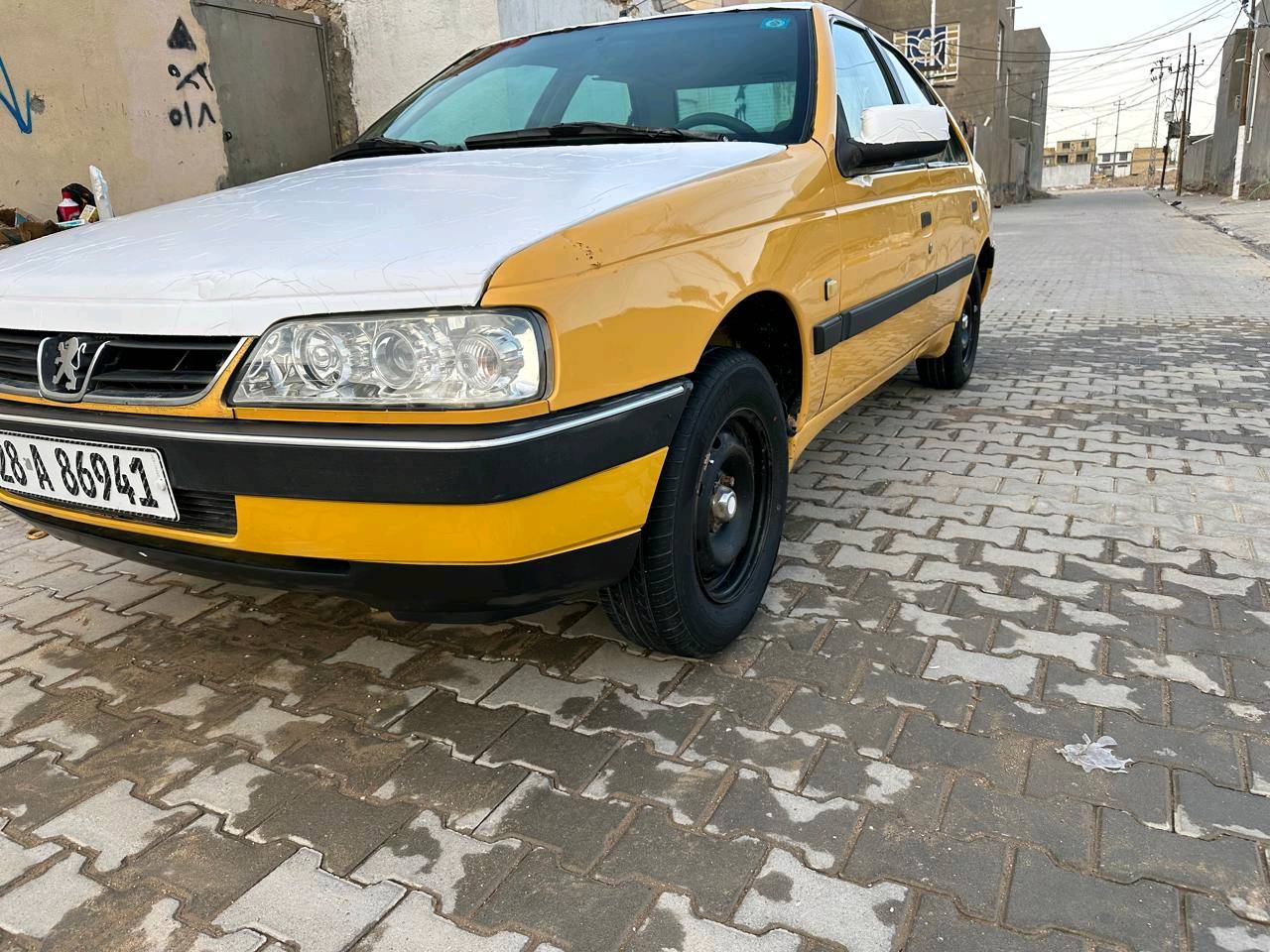 بيجو اكد 405 مكينه جديدة قبل فتره شادها كير جديد حداديه مشط تخم تاير كله مكفول سنويه وارقام جدد   مكان السياره ديوانية2031