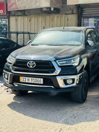 تويوتا هايلوكس 2023 Double cab 4*4   اللون اسود ⚫️   مادة المقعد قماش ...