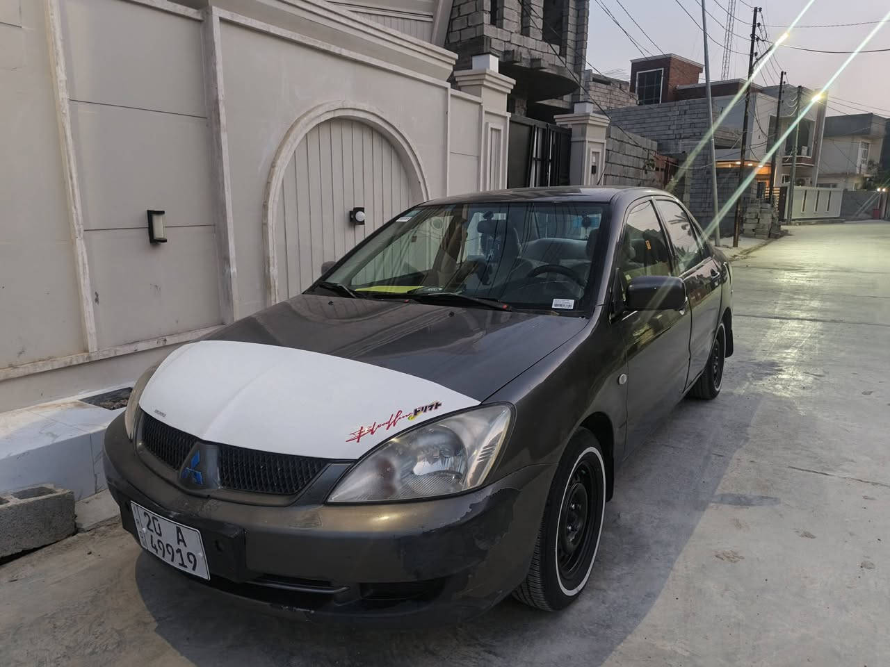 لانسر ٢٠١٠ ....  ١٦٠٠ رقم ديالى بسمي  هزة سنوية جدد ضرره جاملغ خلفي أيسر مصبوغه كله جمالية اثر جراد سعر  70  مكانه ديالى بعقوبة للاتصال  ***********
