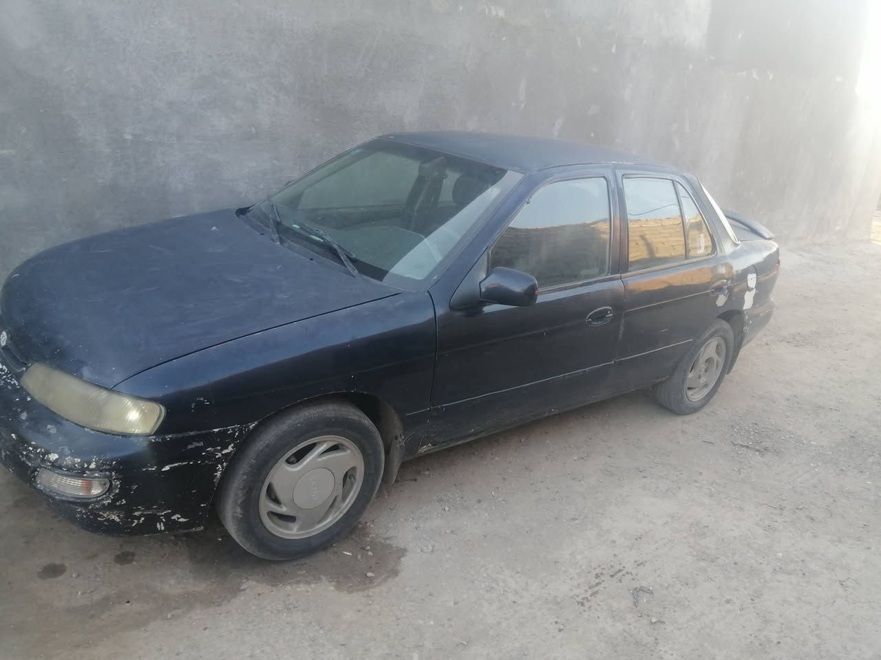 السلام عليكم للبيع سياره كيه سيفيا موديل ٩٥ رقم بغداد مشروع وطني رقم انكليزي السيارة مال جناي حداديه نضيفه هزه جديده مكينه مفتوح كير عادي كهربائات شغاله السعر ٢٨ وبيهه مجال العنوان واسط الصويرة رقم الهاتف *********** مامتواجد على الفيس الشراي يتصل ويدلل ولمايعجبه لايعلق الشراي يدلل
