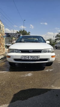 للبيع كورلا ١٩٩٣ رقم بغداد باسمي هزه جديه رقم دولي بيها مكانات صبغ وبا...