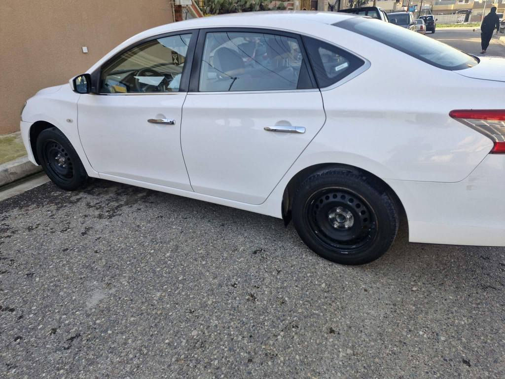 للبيع نيسان سنترا خليجي موديل 2018 السيارة مكفولة من صبغ وتبديل ومحرك وكير بشرط ماشي١٣٠ السعر121 وبي مجال مكان سيارة موصل رقم الموبايل*********** متوفر وتساب أربيل, العراق
