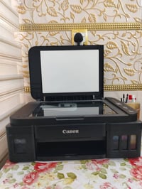 طابعة كانون ٢٤١١ • ملونة • متركه