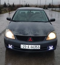 لانسەر مۆدێل 2008 گێڕ ئۆتۆماتیک  مەکینە گەورە ناو فۆڕمیگا دەعم و لێدرا...